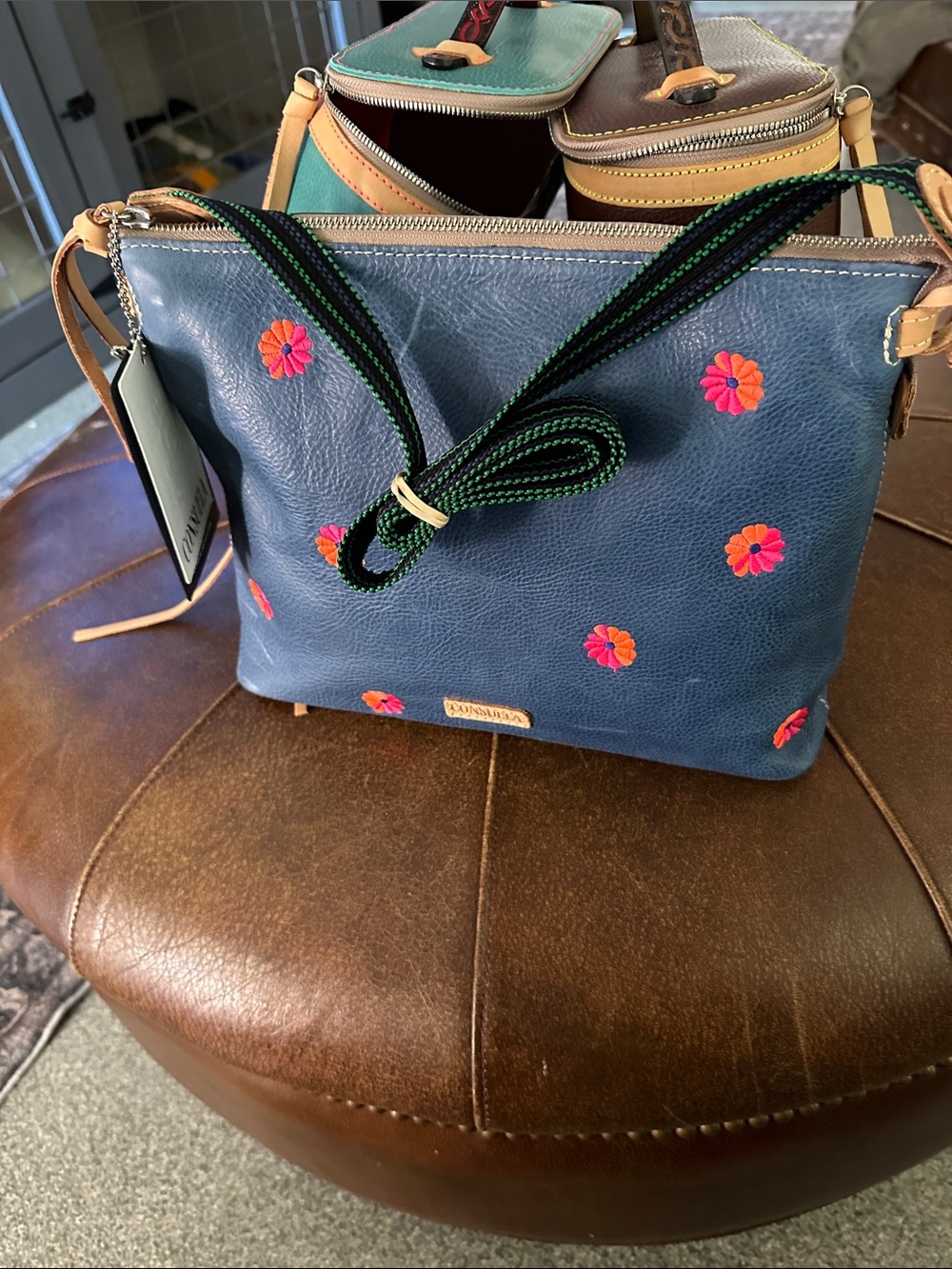 Consuela Downtown Pax Blue Crossbody with Pink & Orange Floral Embroidery